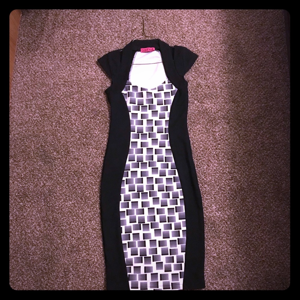 a long over the knee black and white dress,